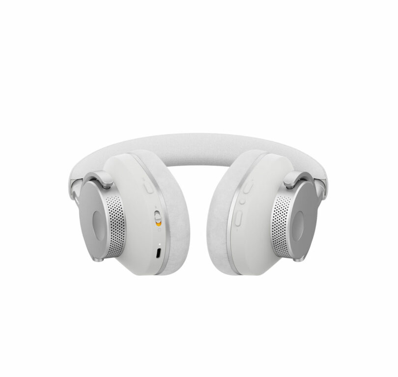 The Melomania P100 offers a pair of grey and white over-ear headphones with a sleek, minimalist design.