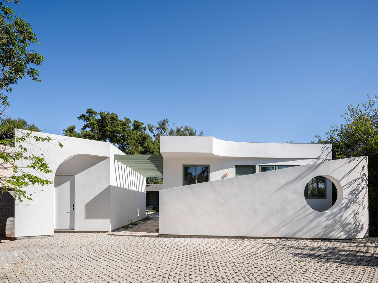 Moongate ADU: A Playful, Modern Blend of Geometry and Generations