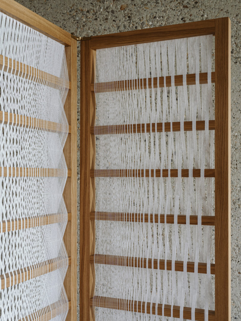 details of a paper and wood room divider