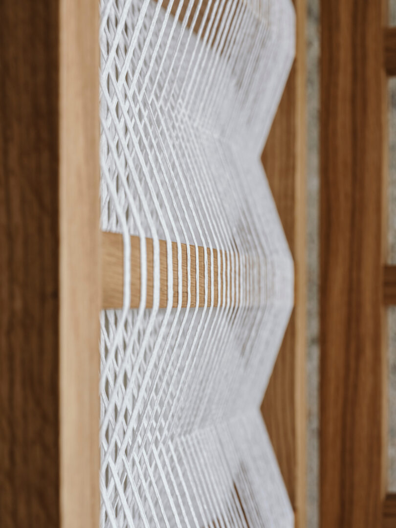 details of a paper and wood room divider