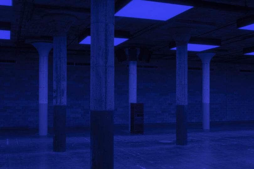 Speaker in room with blue light